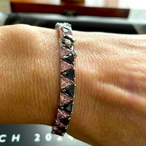 Sterling silver bracelet with black and pink stones